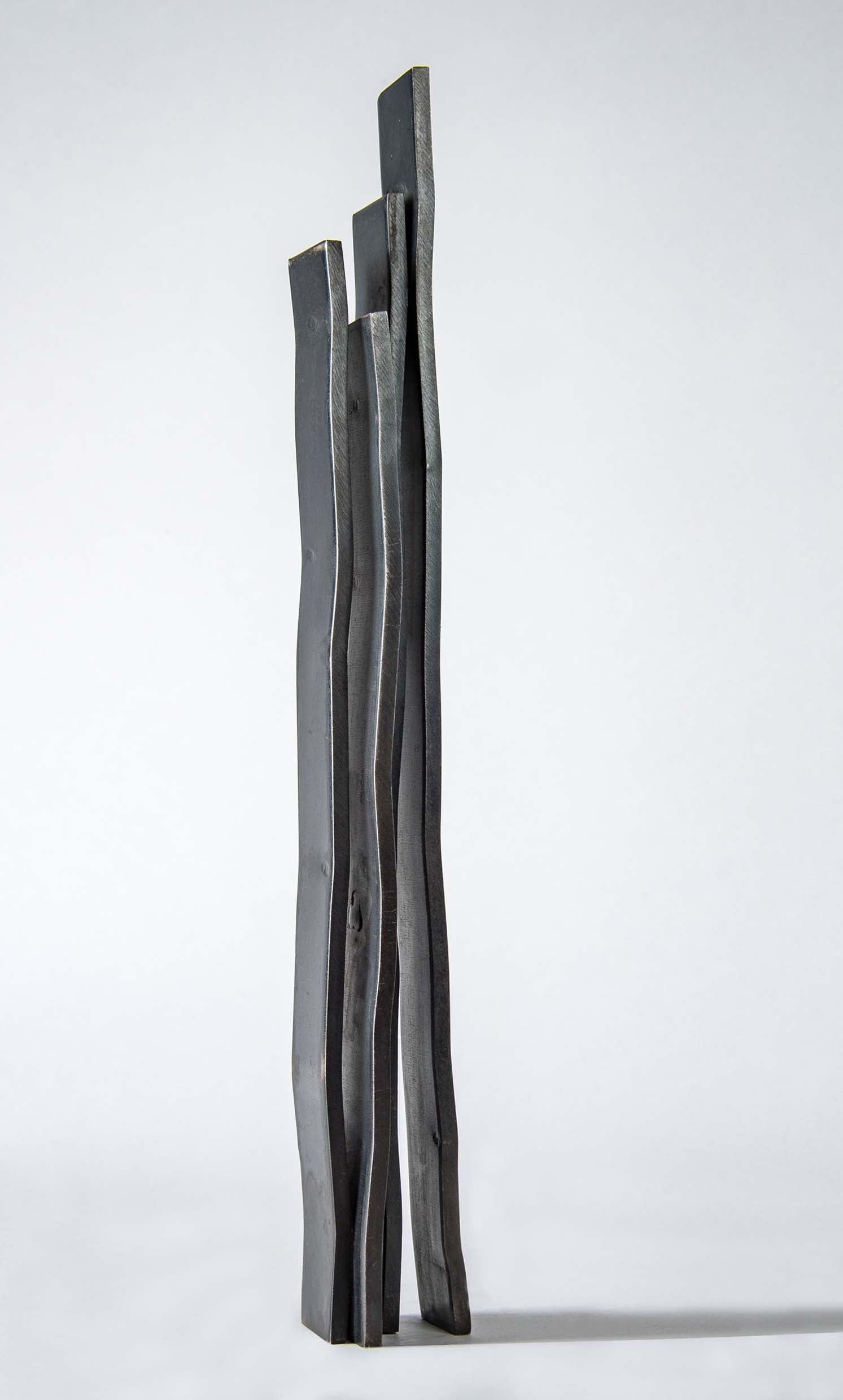 Quatre lames verticales