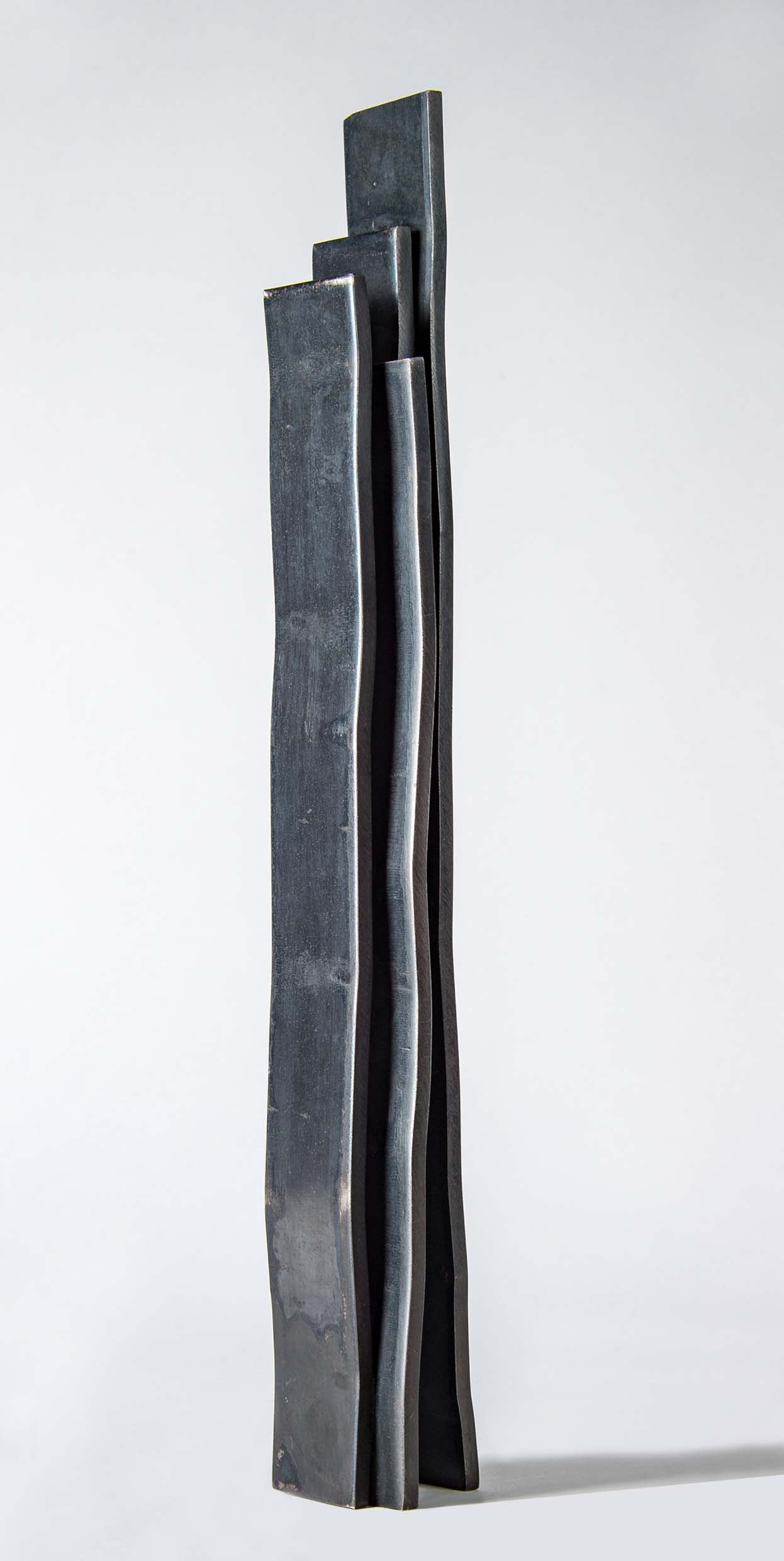 Quatre lames verticales