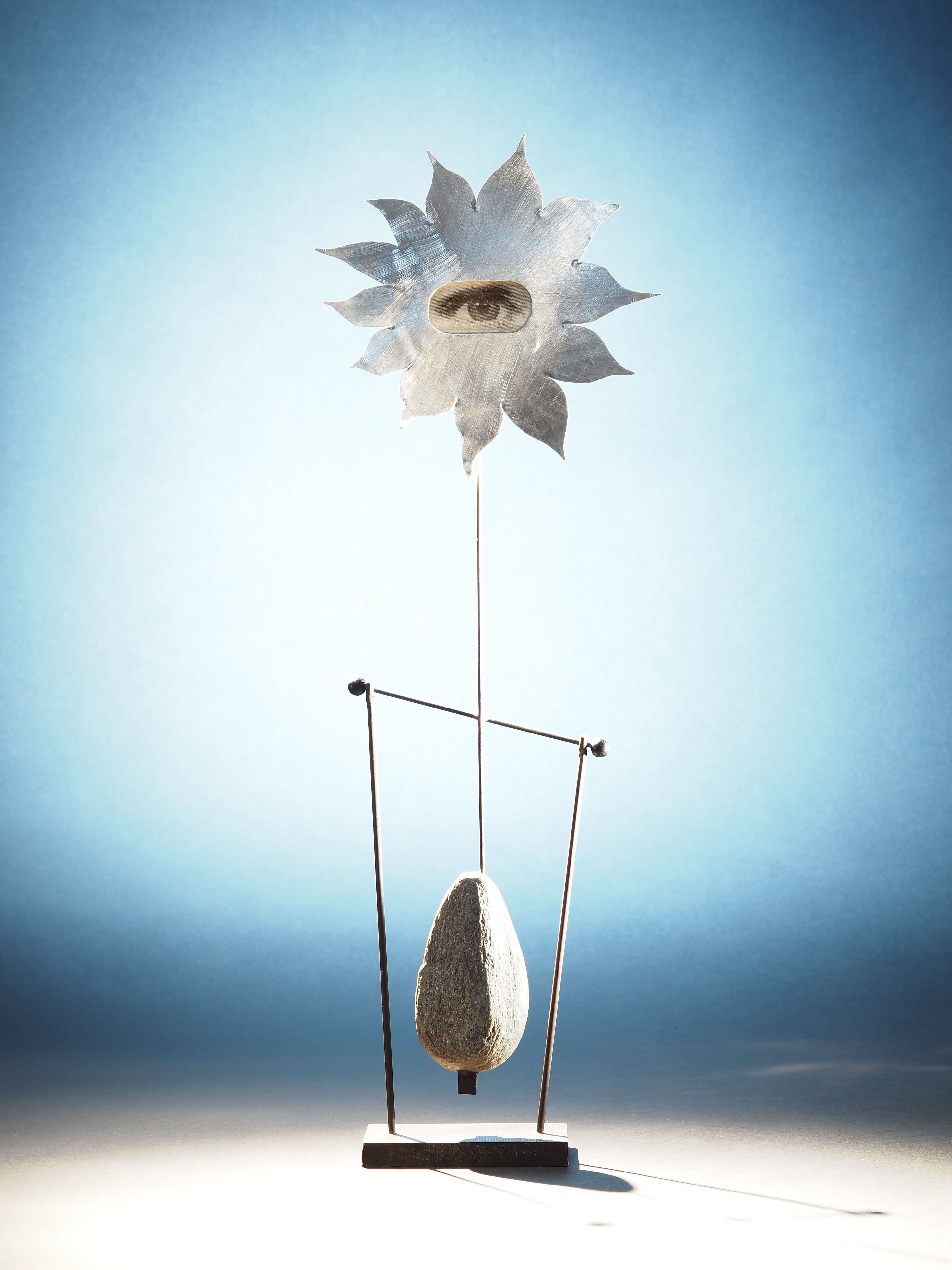 Soleil clin d'œil pendule